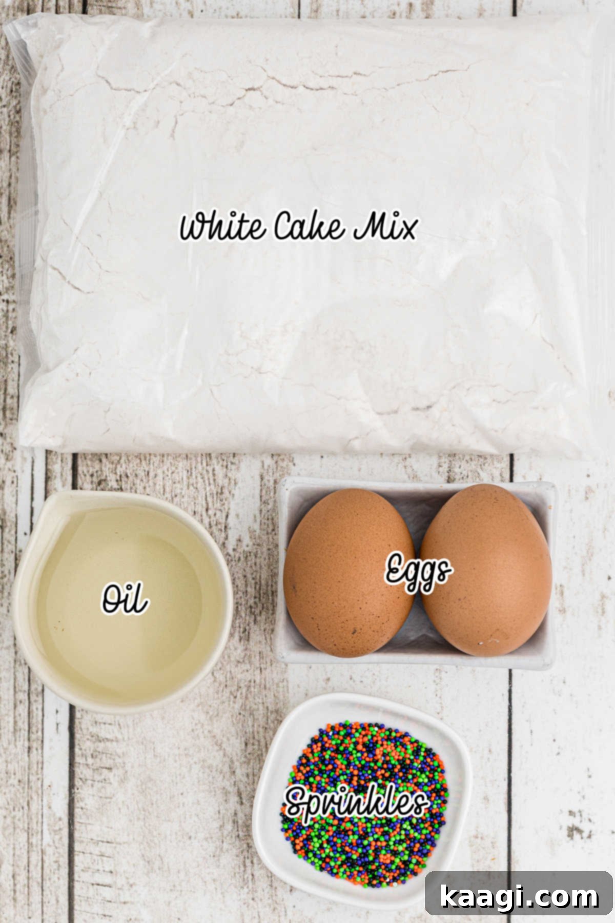 Spooktacular Sprinkled Cookies 3 All the simple ingredients for Halloween cake mix cookies laid out on a surface.