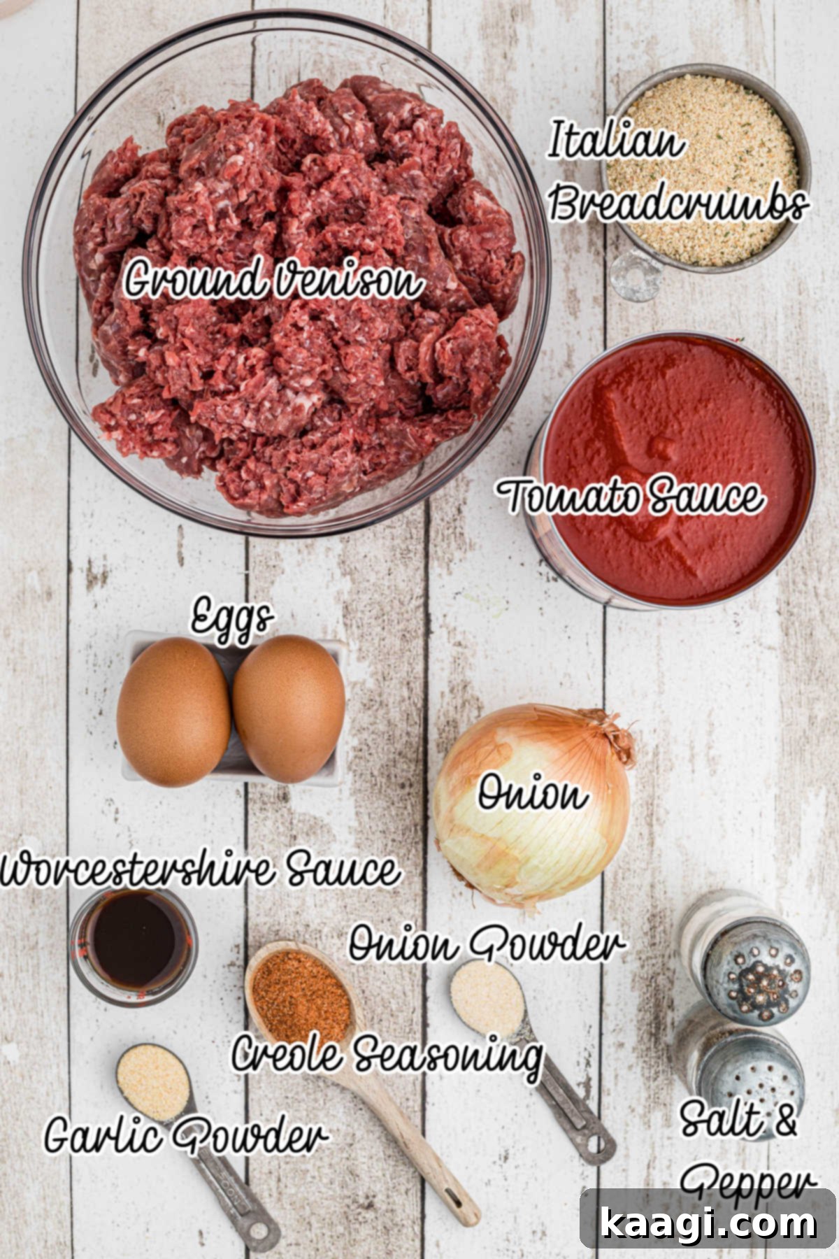 An overhead shot showcasing all the fresh and carefully measured ingredients laid out for making a delicious Venison meatloaf recipe, including ground venison, fresh vegetables, aromatic spices, and binding agents.