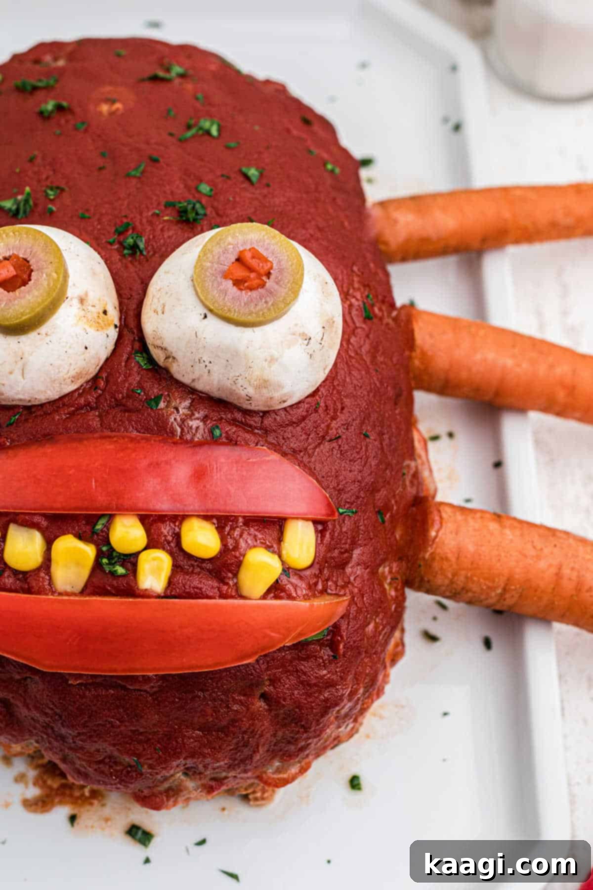 Close up side view of a monster meatloaf, showcasing its detailed features.