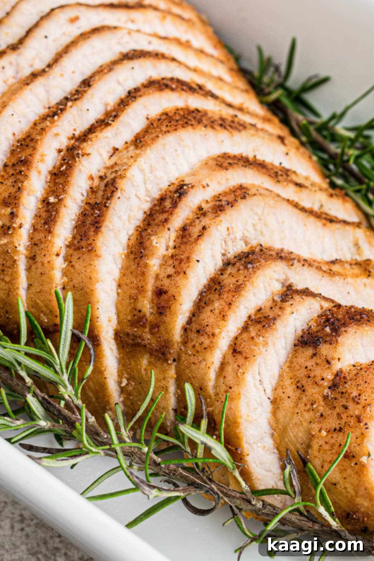 Close up of perfectly carved slices of juicy Cajun turkey breast.