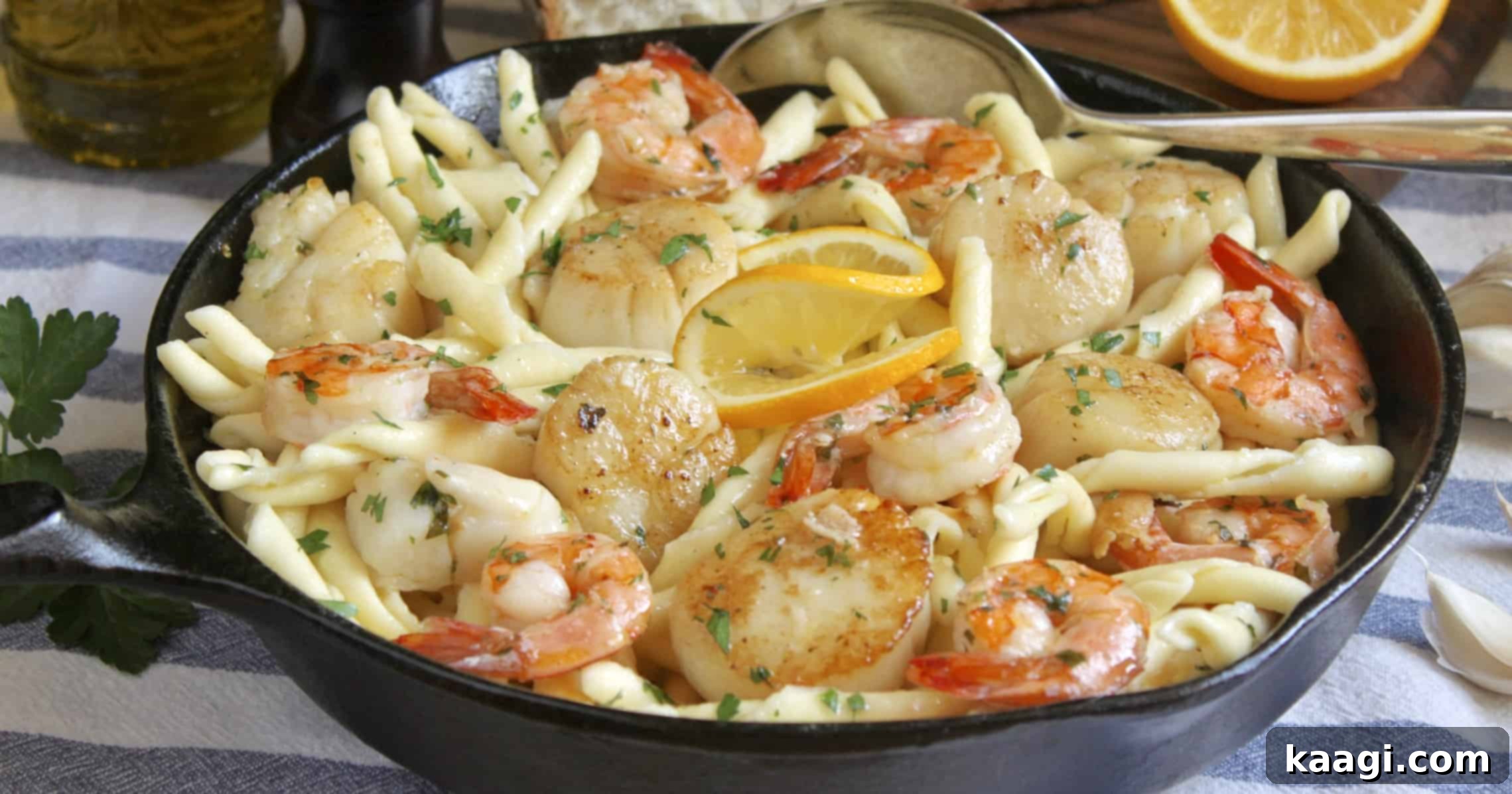 Seafood pasta with shrimp and scallops (and garlic) in a rich sauce.