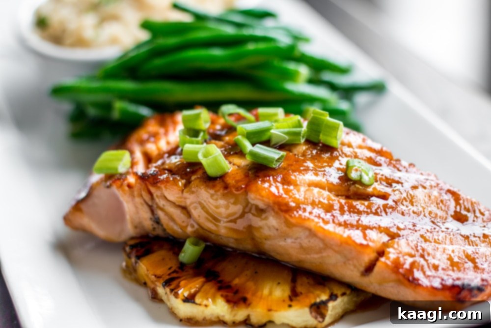 Air Fryer Soy Maple Salmon fillet with a glistening glaze.