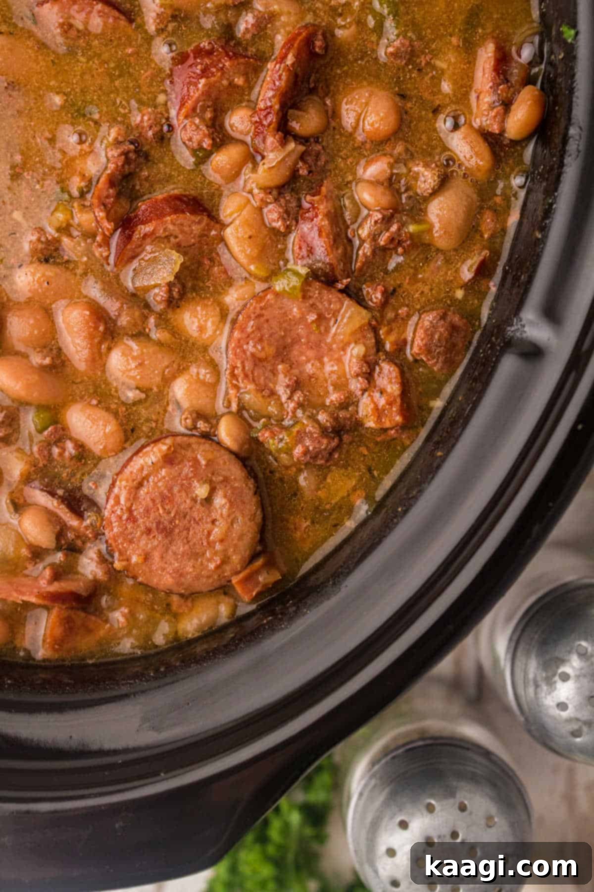 Pinto Bean Perfection: The Ultimate Sides 3 close up of some crock pot beans with sausage