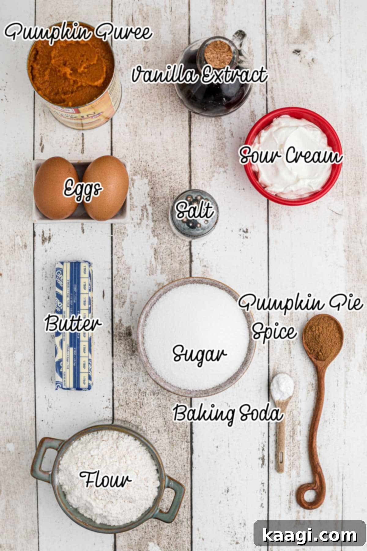 A flat lay photograph showcasing all the dry and wet ingredients neatly arranged, ready to be used for Amish Pumpkin Bread.