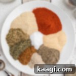 A plate full of arranged seasoning in a circle, ready for a delicious Cajun Two Step recipe.