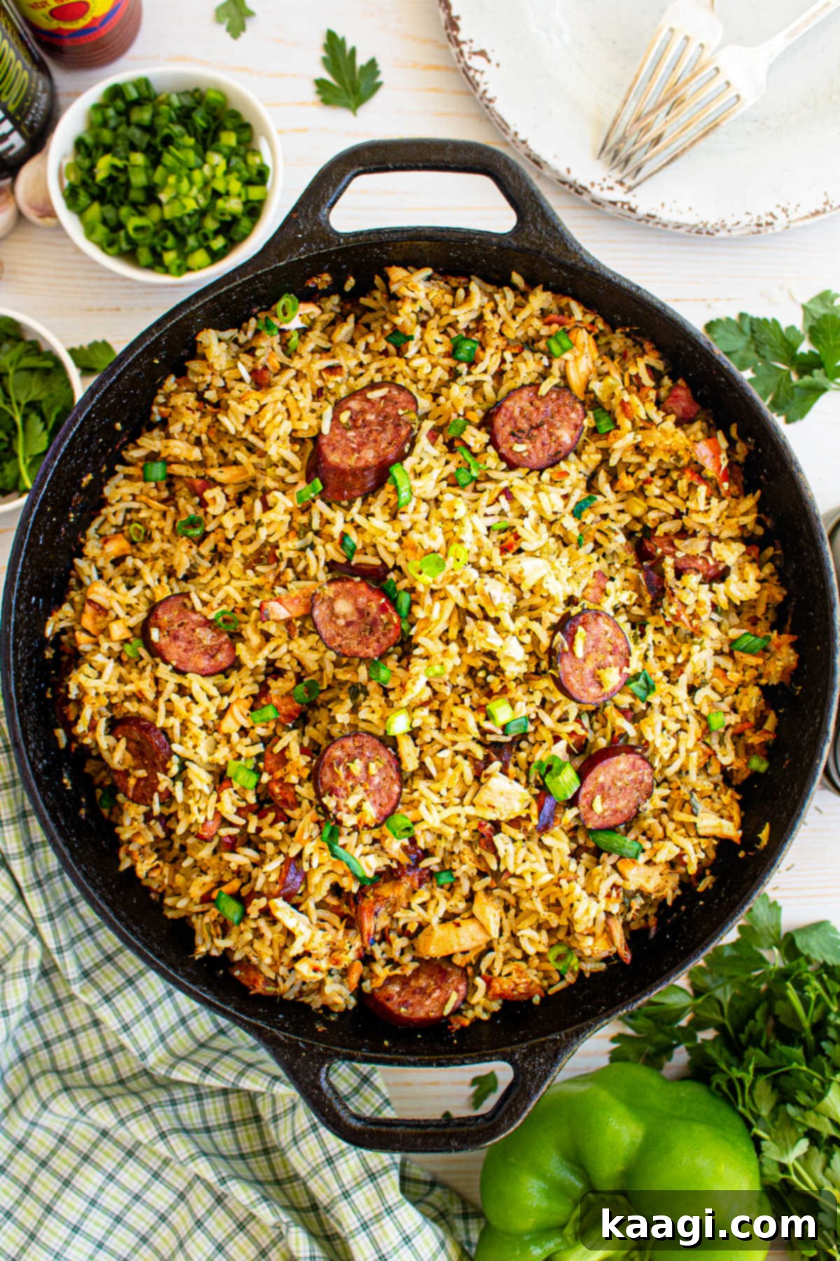 Authentic Louisiana Jambalaya 2 Overhead shot of a rustic cast iron pot brimming with delicious Cajun Jambalaya, ready to be served.