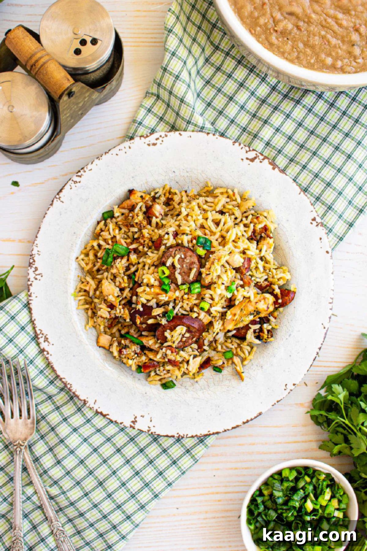 Authentic Louisiana Jambalaya 5 A perfectly portioned plate of Cajun Jambalaya, showcasing the rich colors of the rice, meats, and vegetables, ready to be enjoyed.