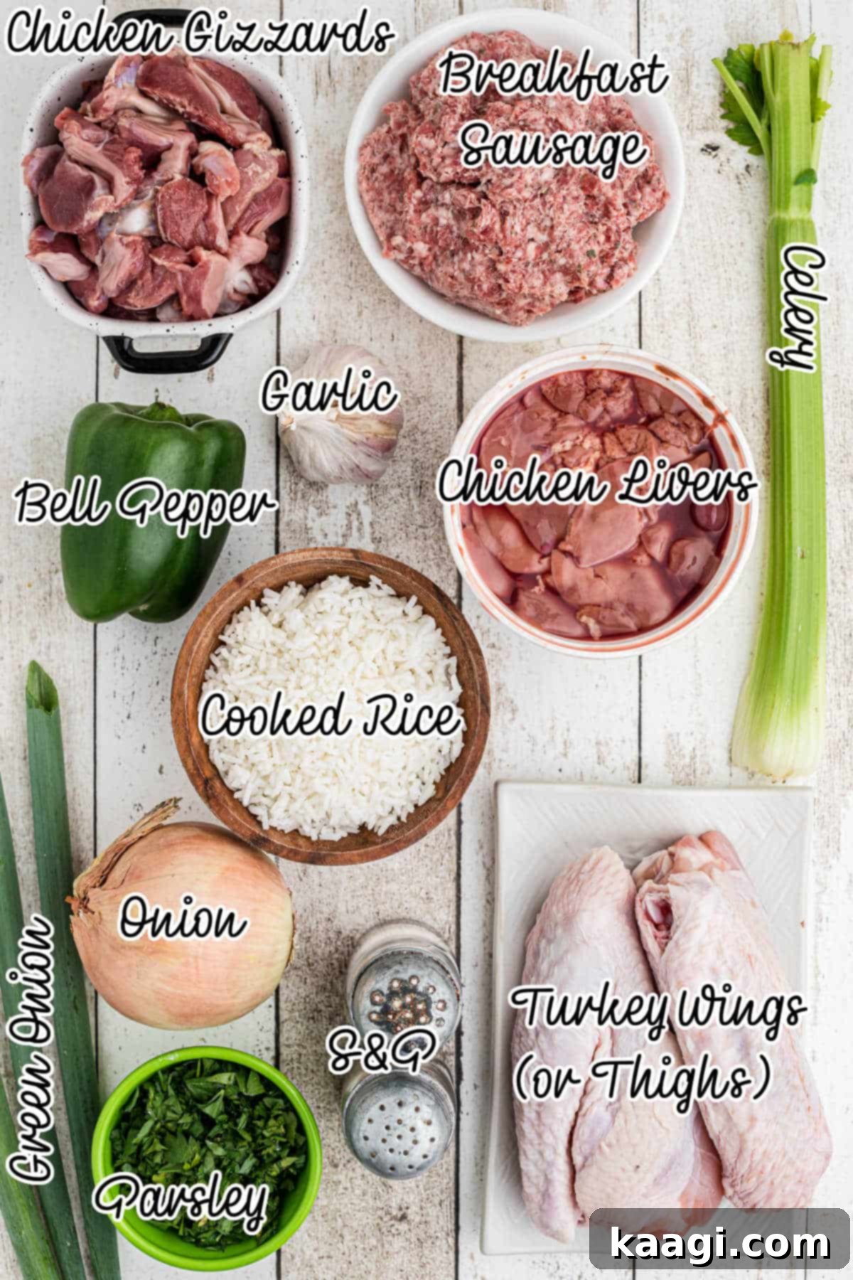 Overhead shot of ingredients needed to make a Cajun rice dressing, neatly arranged.
