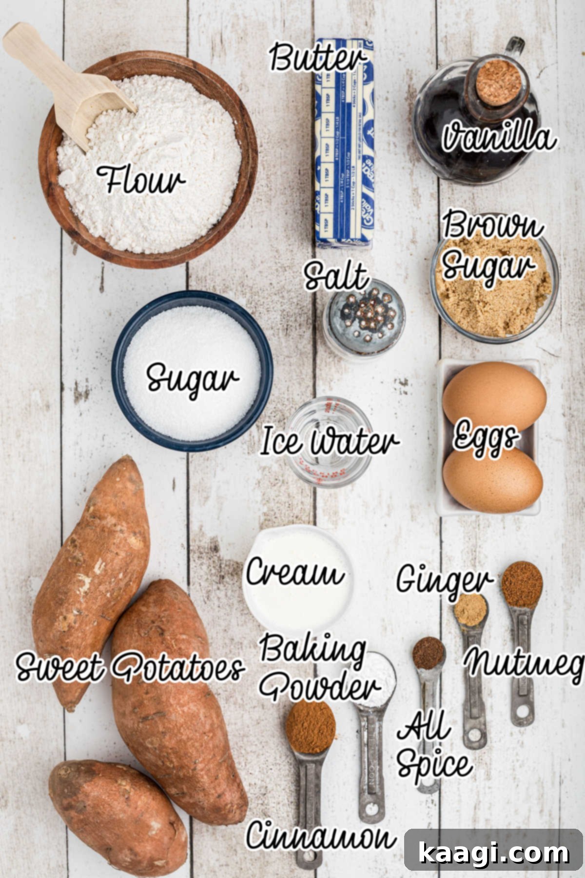Overhead shot of ingredients laid out, featuring sweet potatoes, butter, sugar, flour, and spices needed to make a sweet potato pie.