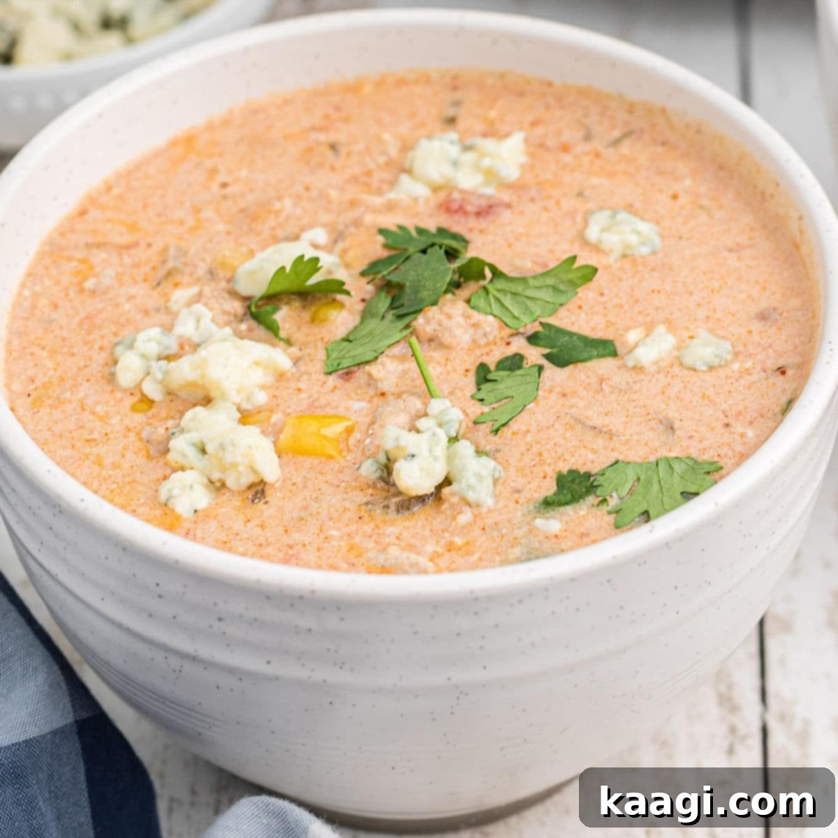 Close up of a bowl of slow cooker buffalo chicken chili.