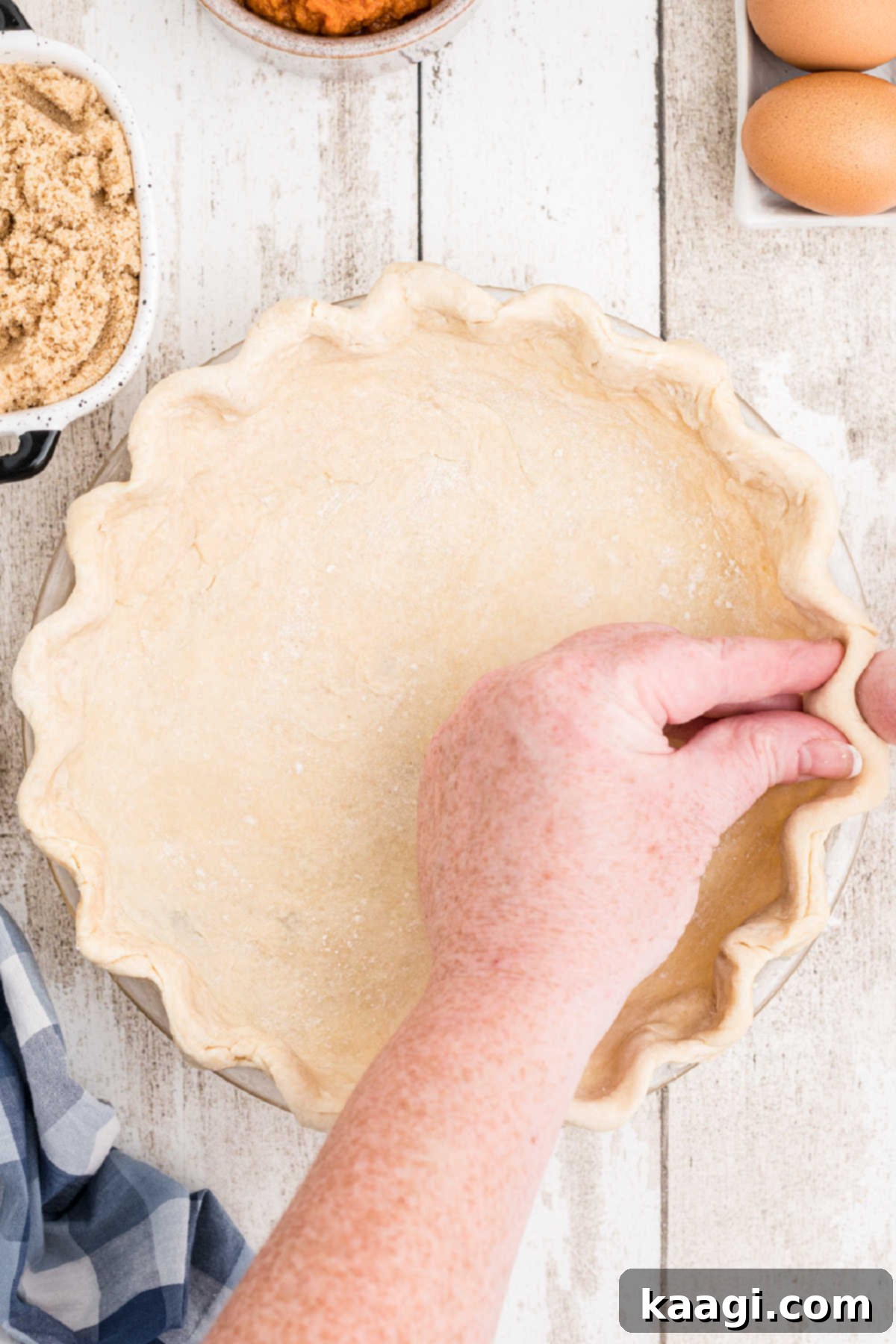 A beautifully fluted Amish pie crust ready for baking.