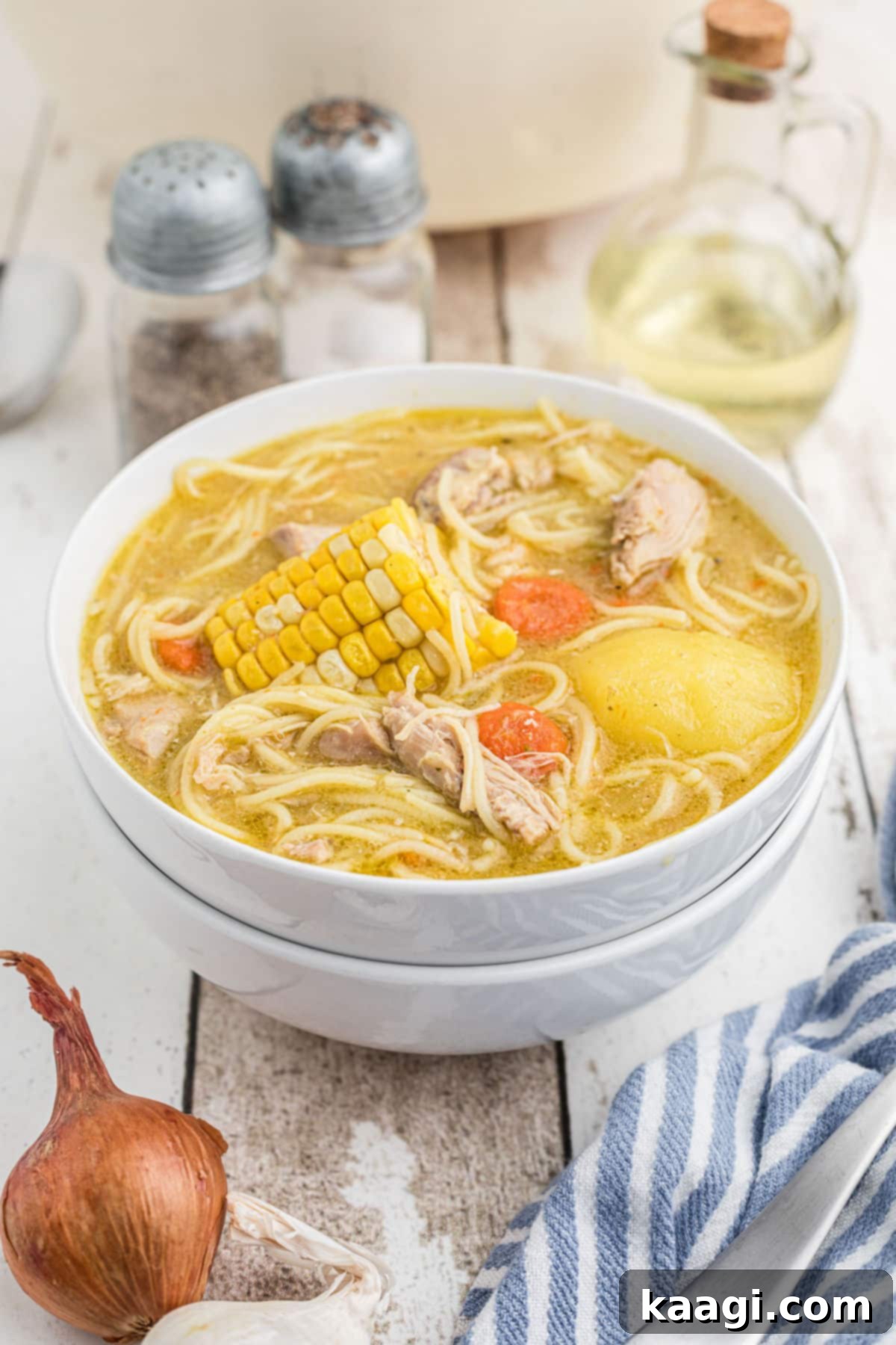 A beautifully dished out bowl of Cuban Chicken Soup, ready to be enjoyed.