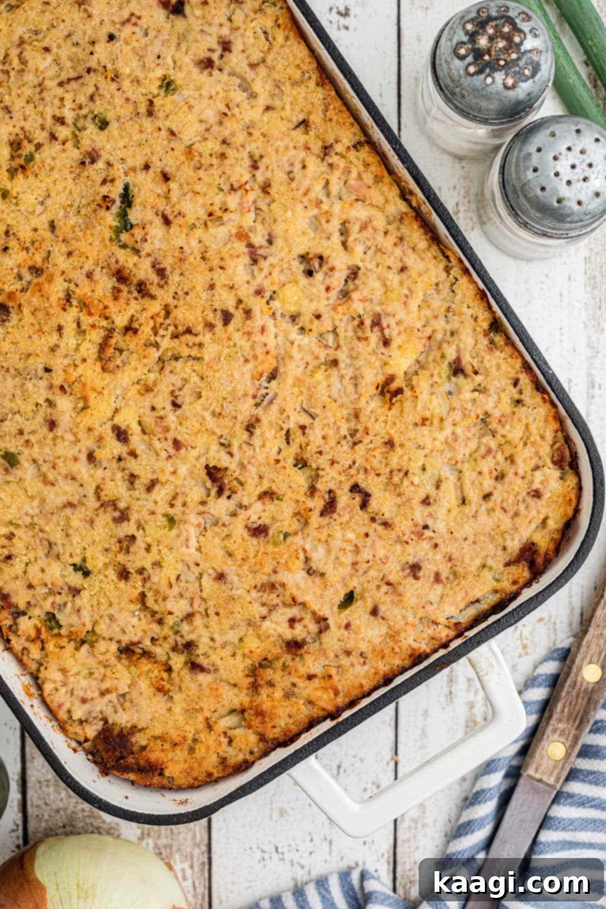 Cajun Cornbread Comfort 2 Overhead shot of a dish full of Cajun Cornbread Dressing.