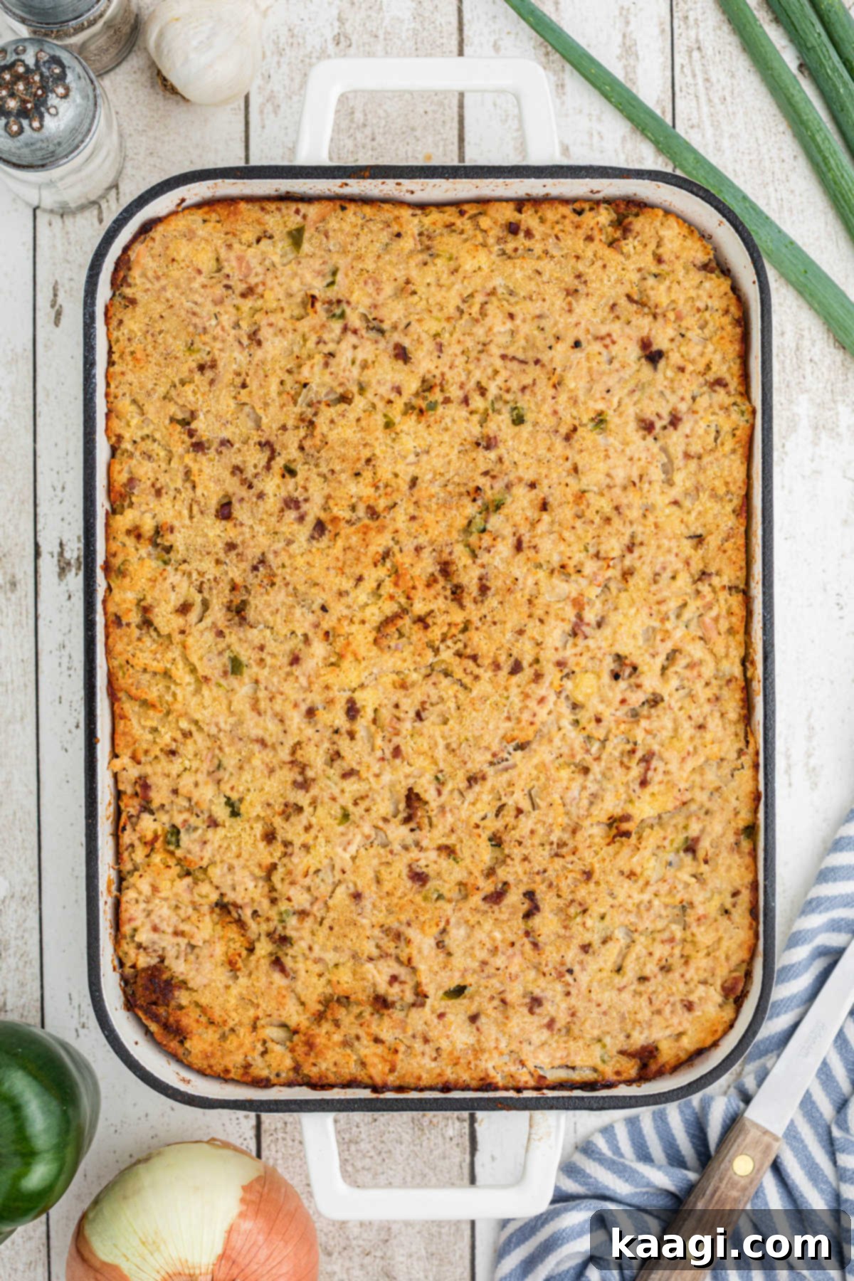Cajun Cornbread Comfort 6 Overhead shot of a pan full of Cajun Cornbread Dressing.
