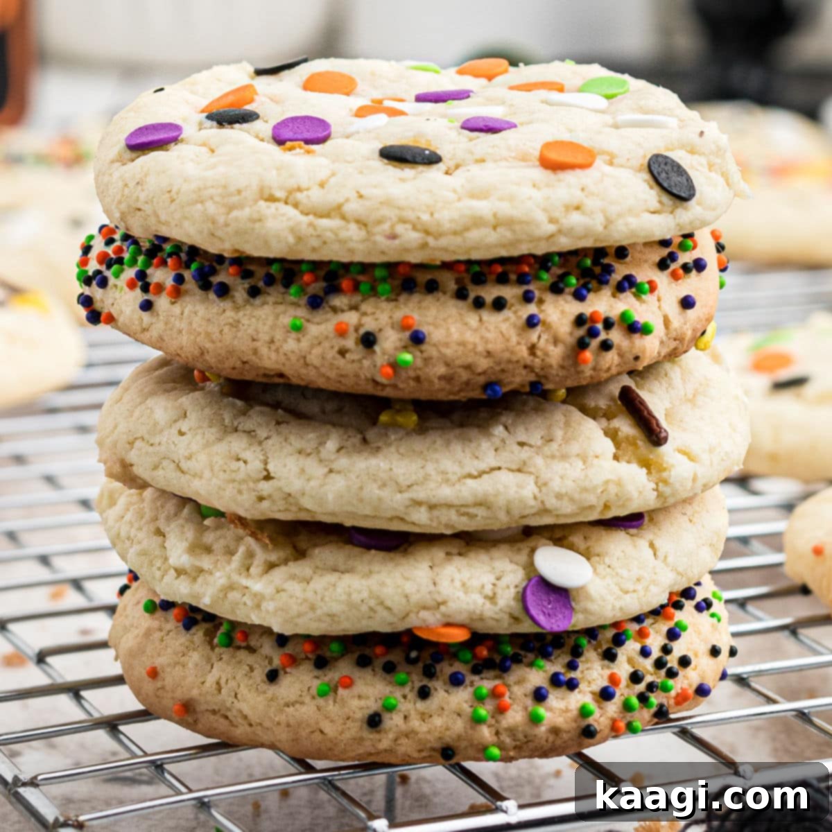 A stack of Halloween cake mix cookies with sprinkles.