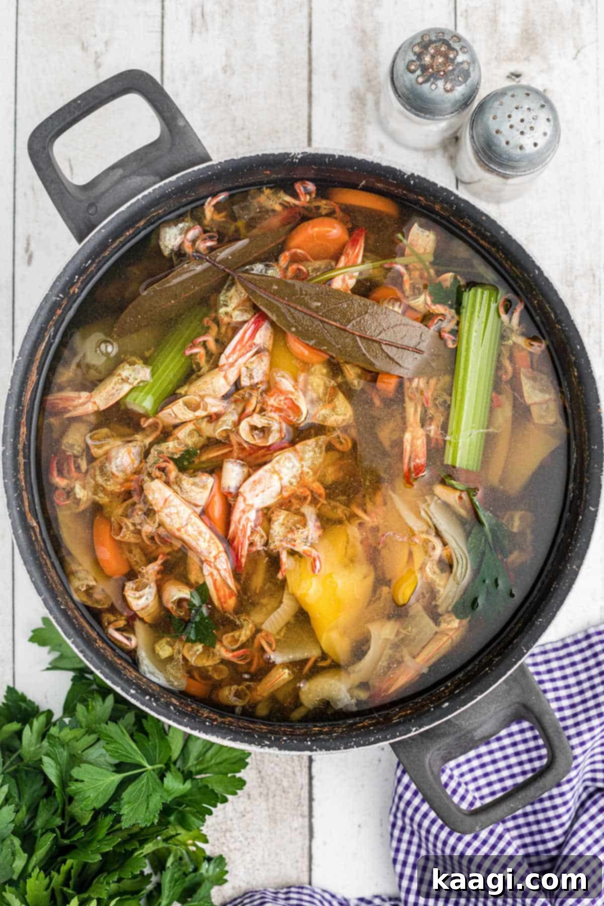 Creamy Shrimp and Sweet Corn Bisque 4 A pot full of shrimp stock being made for a shrimp and corn bisque.