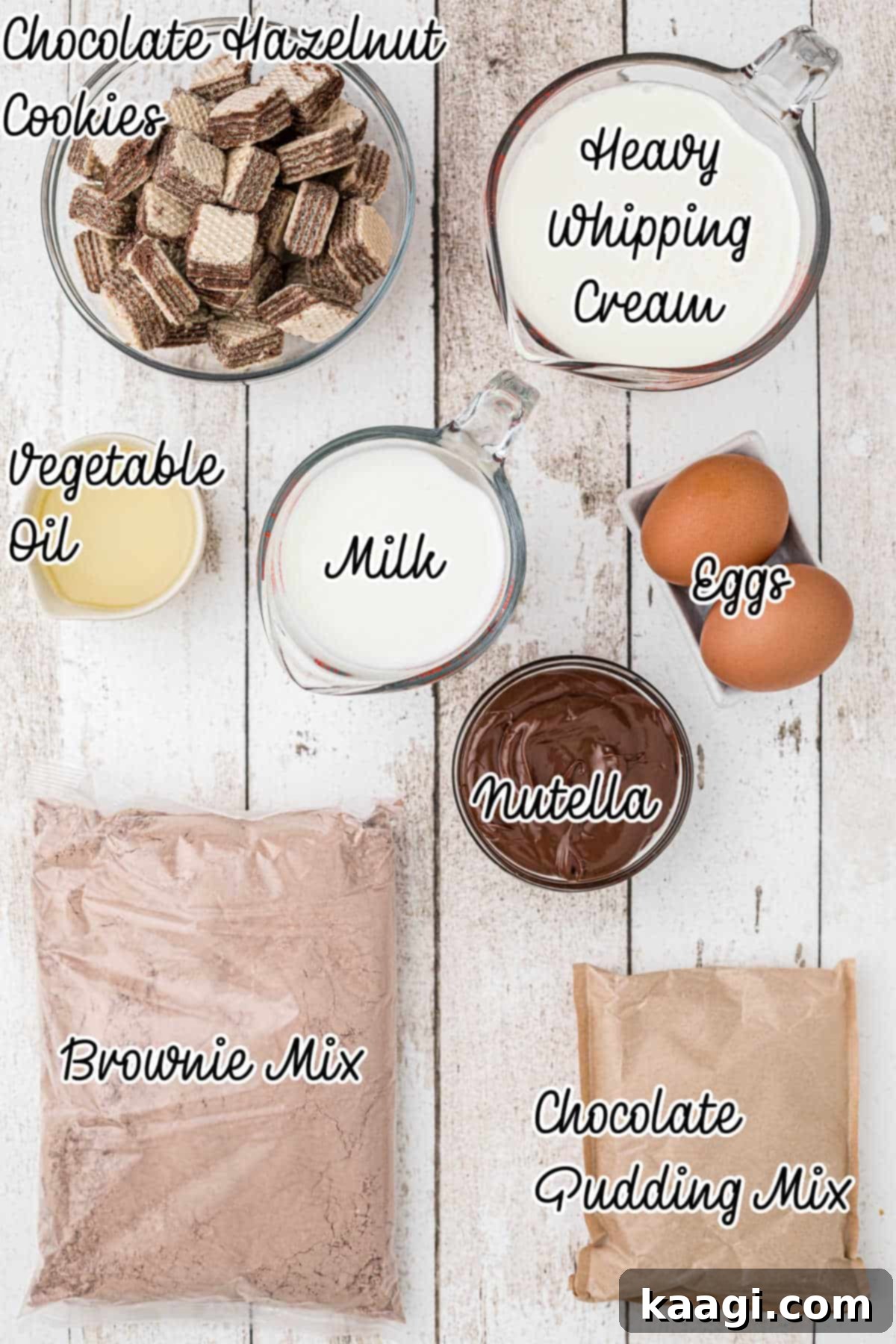 Overhead shot of ingredients needed to make a nutella trifle, including brownie mix, Nutella jar, pudding mix, and milk.