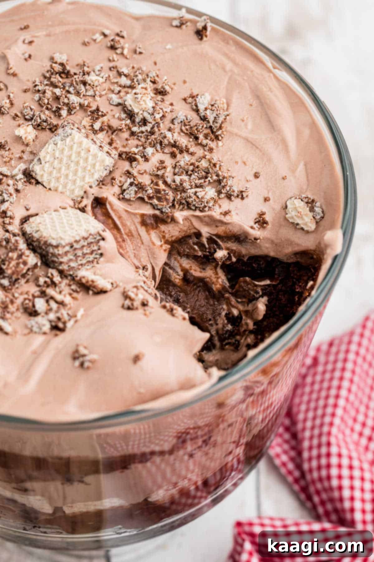 A nutella trifle close up with a scoop taken from it, showing the distinct layers.