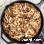 Cast iron pan full of liver and onions.