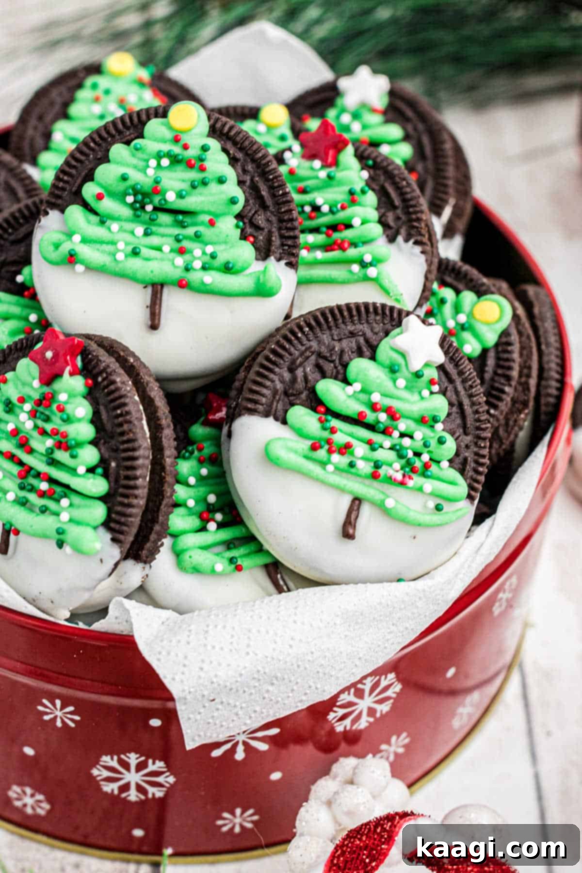 Festive Oreo Delights 2 Side view of a tin of Christmas Oreo cookies with a Christmas tree design, ready for gifting or enjoying.