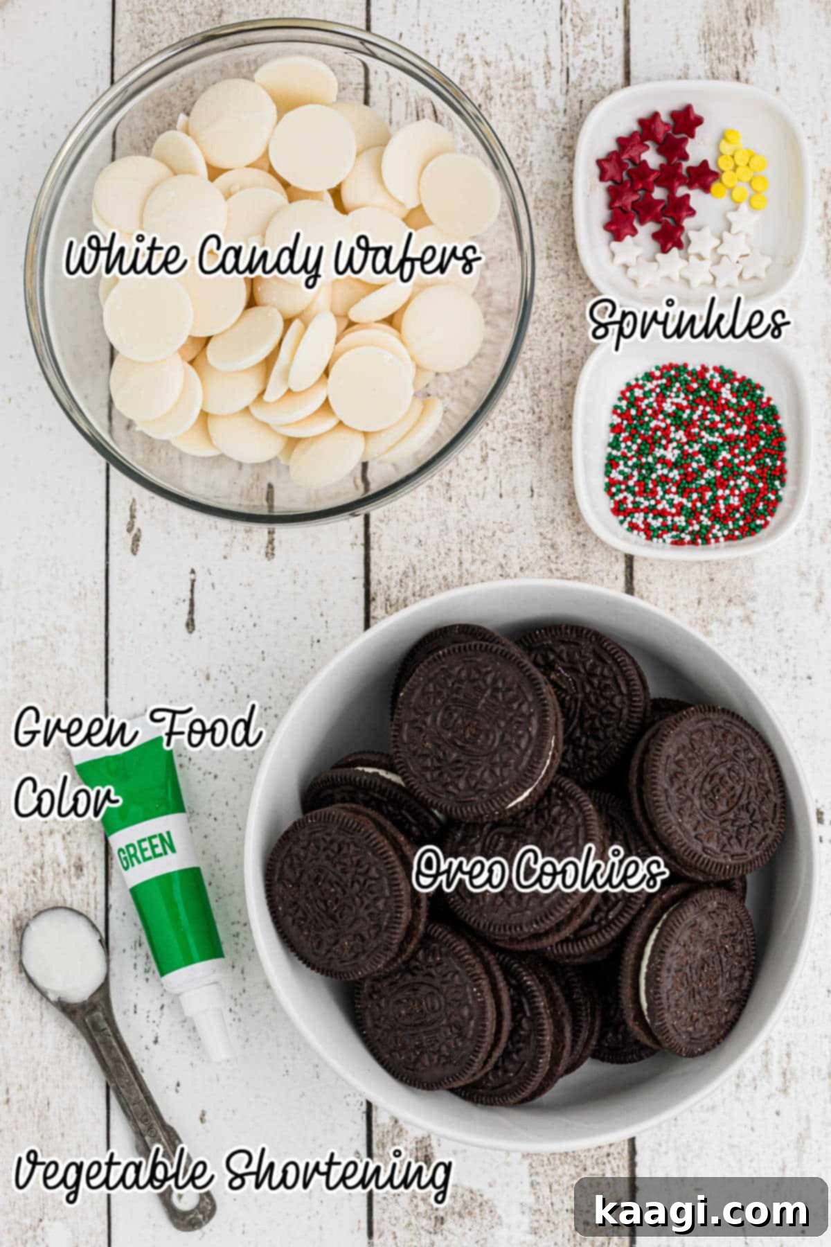Festive Oreo Delights 3 Ingredients laid out on a table, including Oreo cookies, candy melts, food coloring, and sprinkles, ready to make Christmas Oreo cookies.