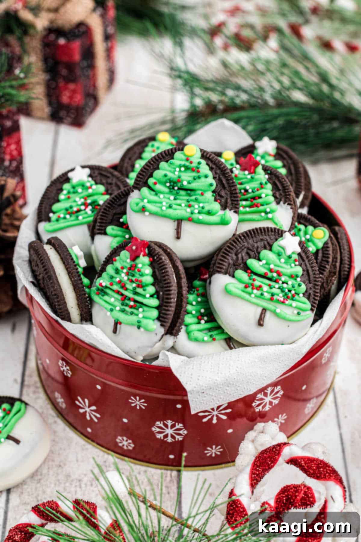 Festive Oreo Delights 5 Beautifully arranged tin of Christmas Oreo cookies with festive Christmas trees, showcasing a thoughtful homemade gift.