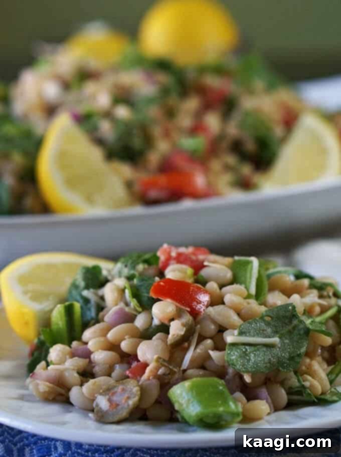 A vibrant bowl of Mediterranean White Bean Salad, fresh and inviting.