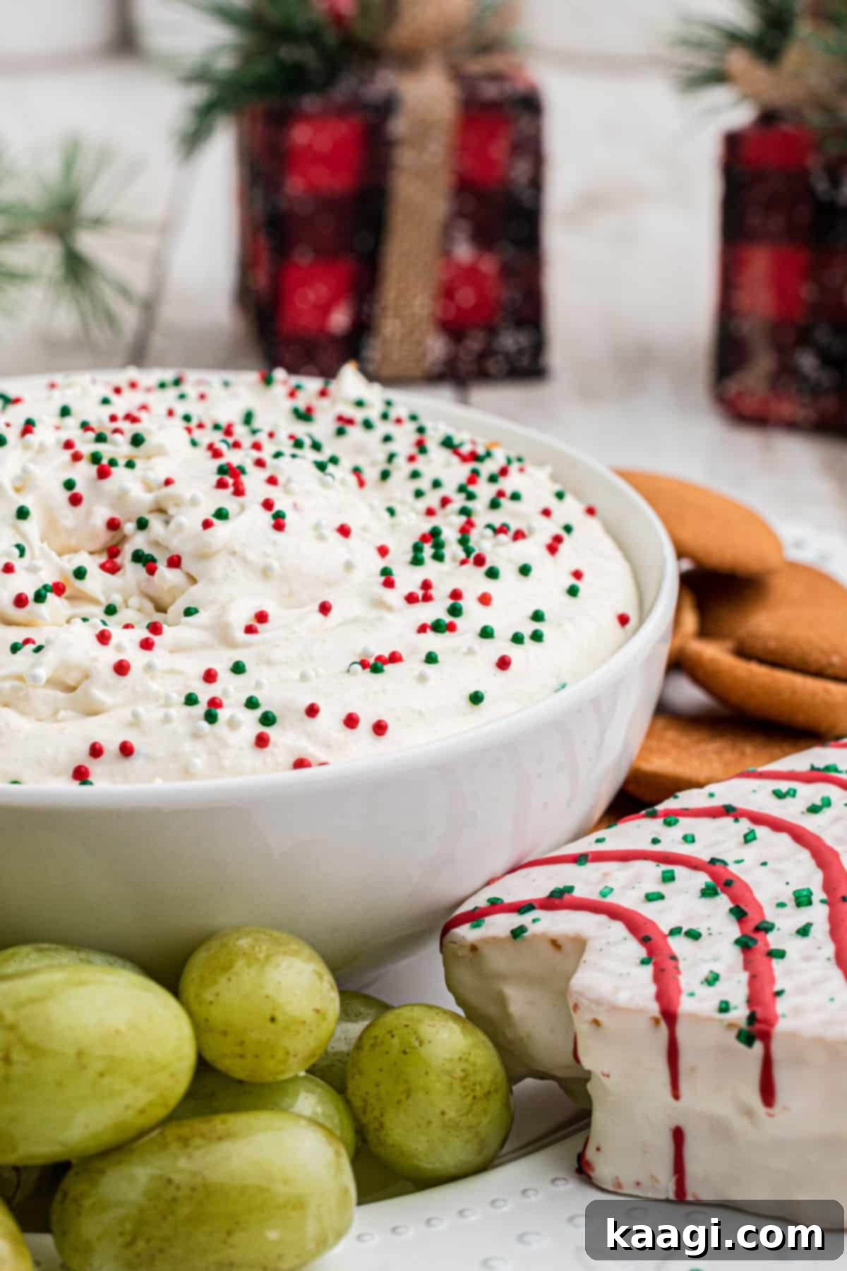 Sparkling Christmas Tree Dip 2 Side shot of a bowl full of Christmas Tree Dip, garnished with sprinkles.