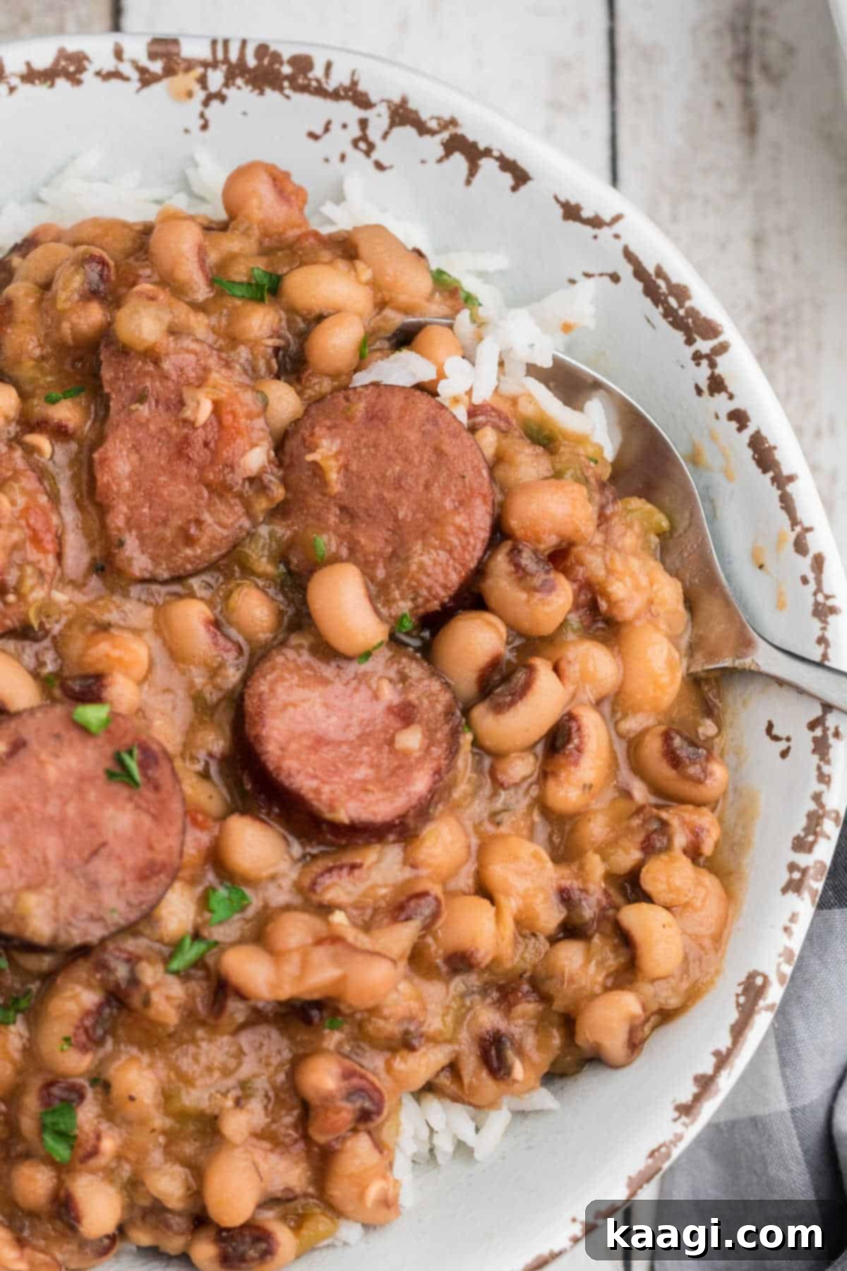 Easy Slow Cooker Hoppin John 6 Another mouthwatering close-up of Crock Pot Hoppin' John, showcasing the tender black-eyed peas and rich broth, perfect for a cozy meal.