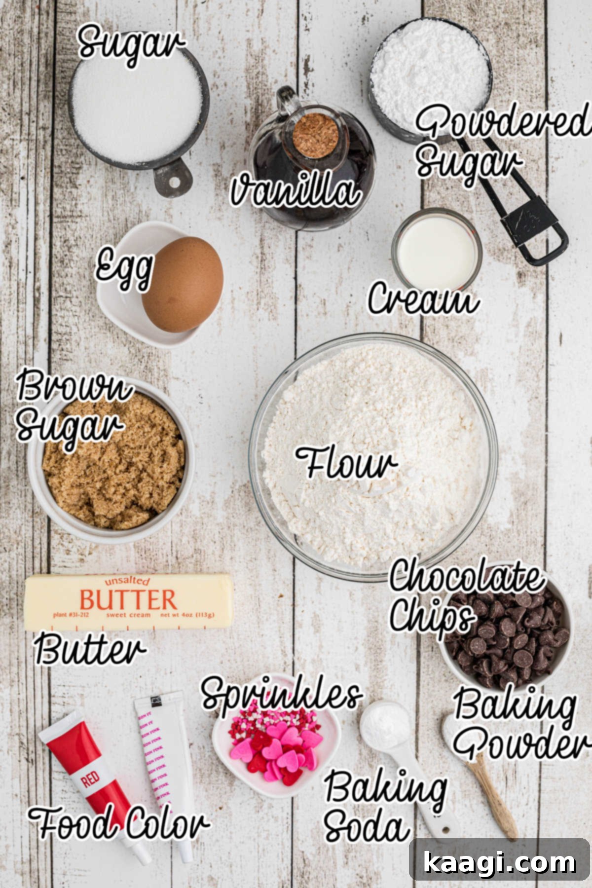 Ingredients needed to make a giant valentines cookie, laid out on a clean surface.