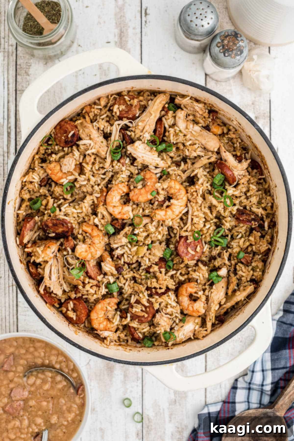 Overhead shot of a Dutch Oven Jambalaya, rich with rice, shrimp, chicken, and sausage.