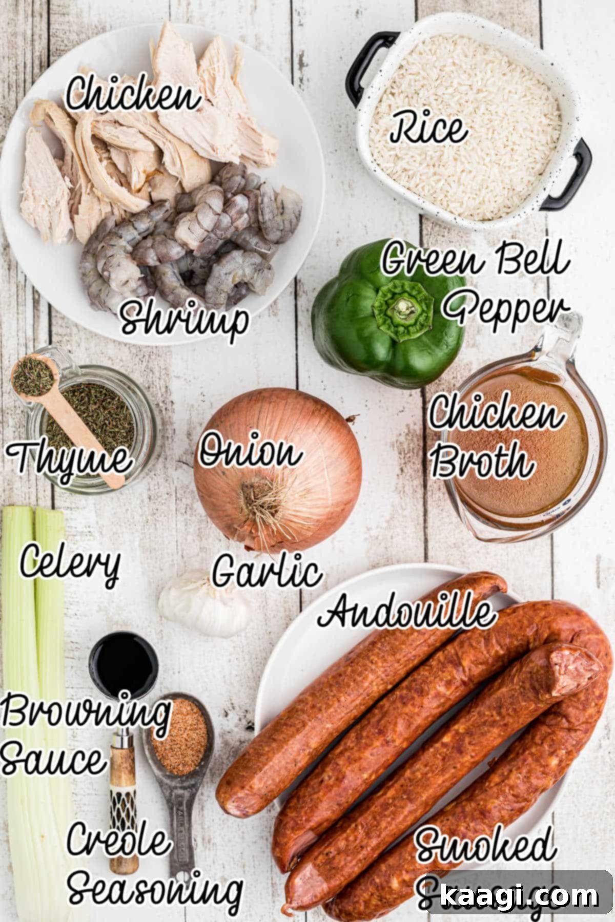 Overhead shot of fresh ingredients laid out for Dutch Oven Jambalaya, including shrimp, chicken, sausages, and vegetables.