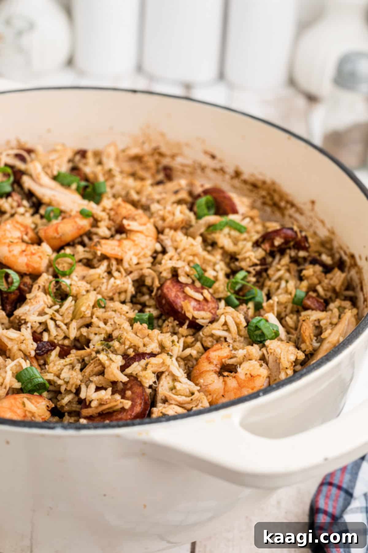 Side shot of a Dutch Oven Jambalaya, showing its fluffy rice and ingredients.