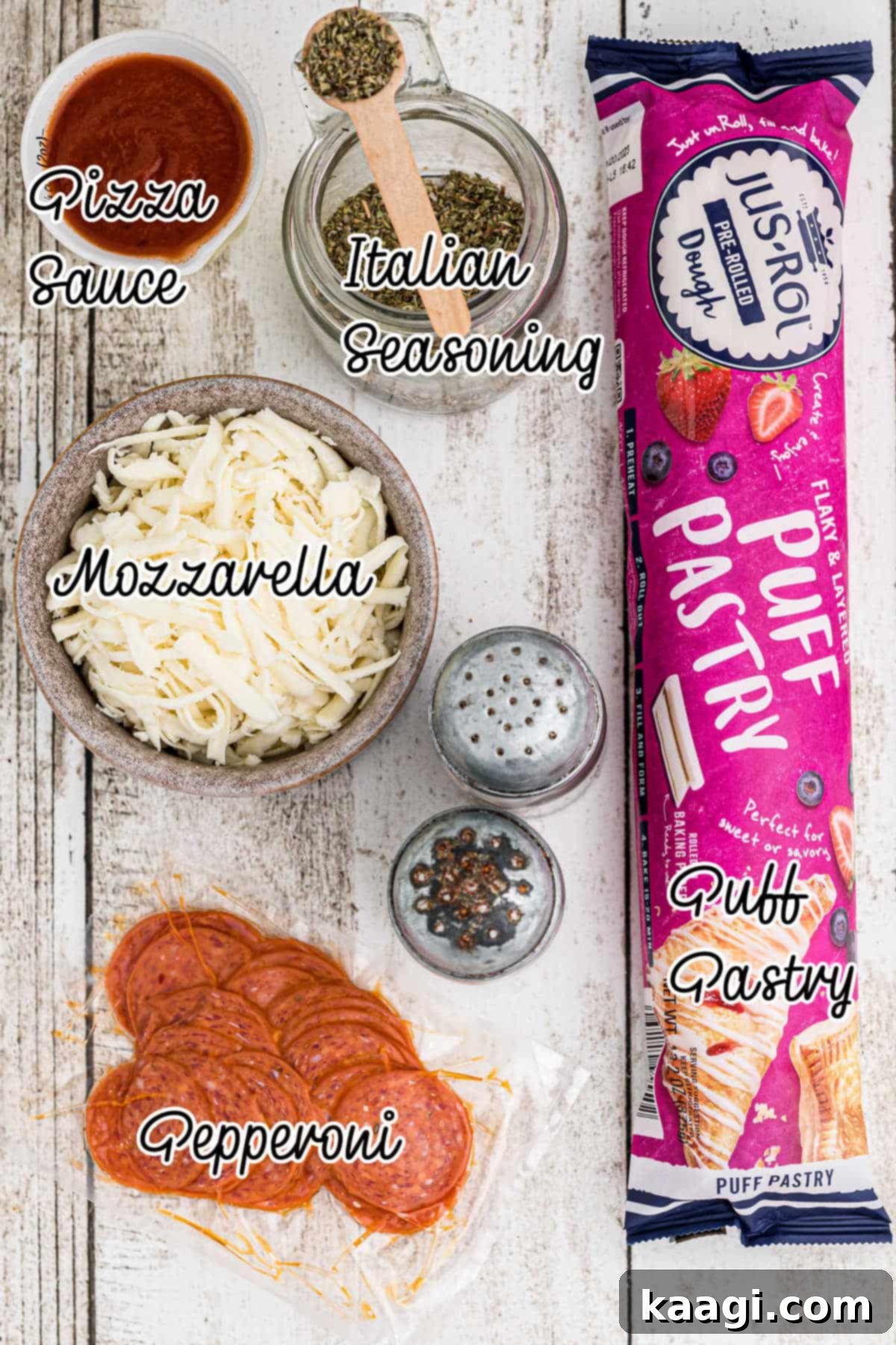 Ingredients needed to make Puff Pastry Pizza Pinwheels, including a sheet of puff pastry, pizza sauce, mozzarella cheese, and pepperoni.